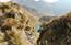 il laghetto visto dal sentiero che dalla Creta di Timau scen ...