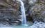 La bella cascata sul Rio Cjampeit